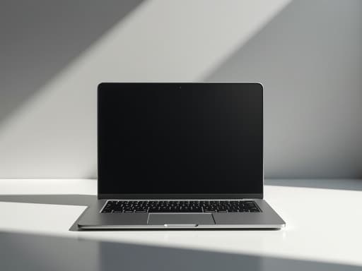 모던하고 미니멀한 모노톤 그레이 배경의 세련된 노트북